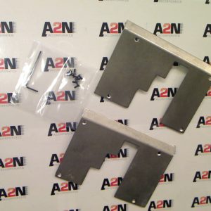 Two metal pieces kept side by side on a white surface